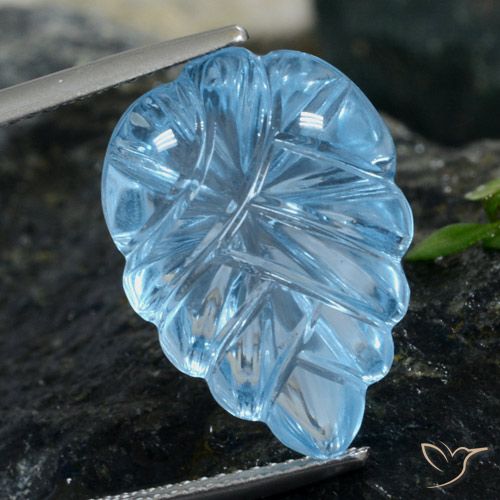 14.95ct 자연스러운 스위스 블루 황옥, 플라워 컷, 투명한