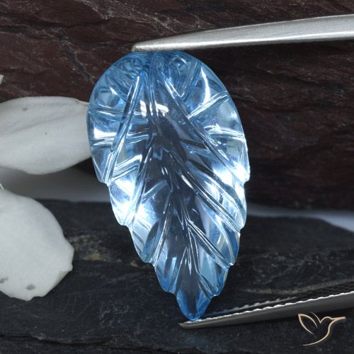 14.78ct 자연스러운 스위스 블루 황옥, 플라워 컷, 투명한