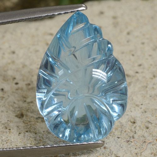 11.15ct 자연스러운 스위스 블루 황옥, 플라워 컷, 투명한