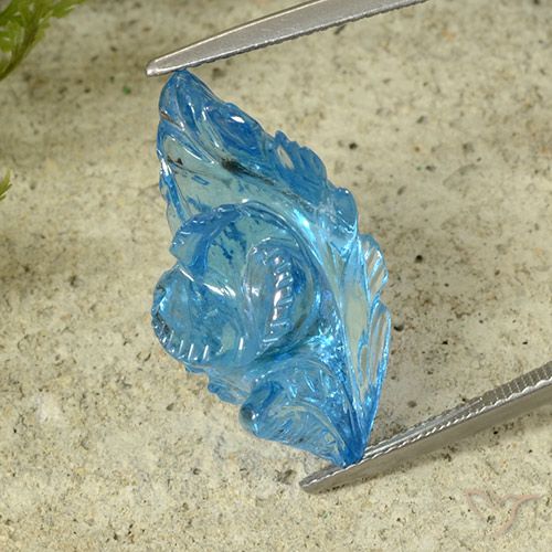 23.87ct 자연스러운 스위스 블루 황옥, 플라워 컷, 투명한