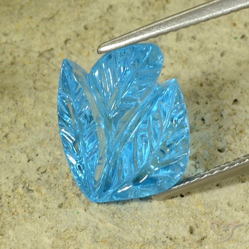 7.81ct 자연스러운 스위스 블루 황옥, 플라워 컷, 투명한