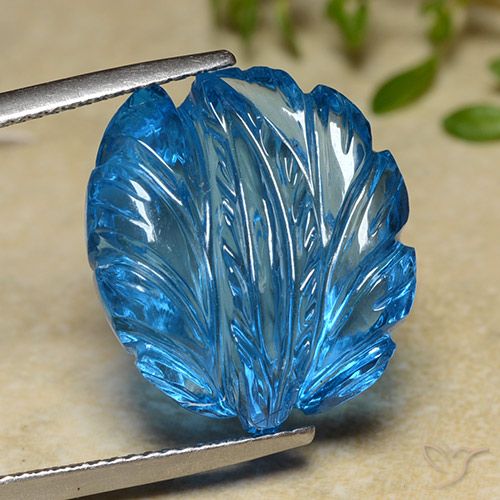 27.42ct 자연스러운 스위스 블루 황옥, 플라워 컷, 투명한