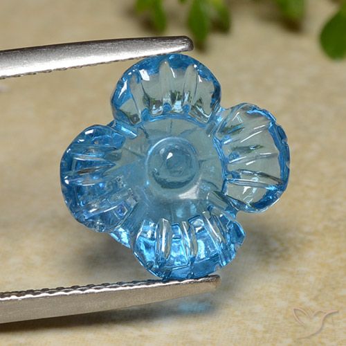 7.40ct 자연스러운 스위스 블루 황옥, 플라워 컷, 투명한