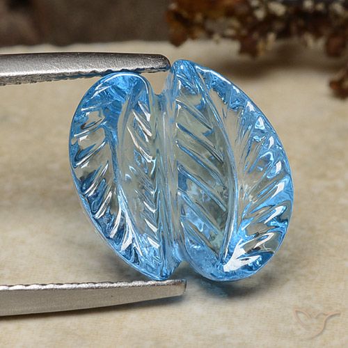 8.24ct 자연스러운 스위스 블루 황옥, 플라워 컷, 투명한