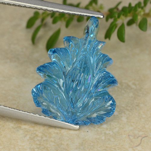 12.05ct 자연스러운 스위스 블루 황옥, 플라워 컷, 투명한