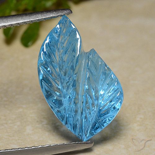 6.82ct 자연스러운 스위스 블루 황옥, 플라워 컷, 투명한