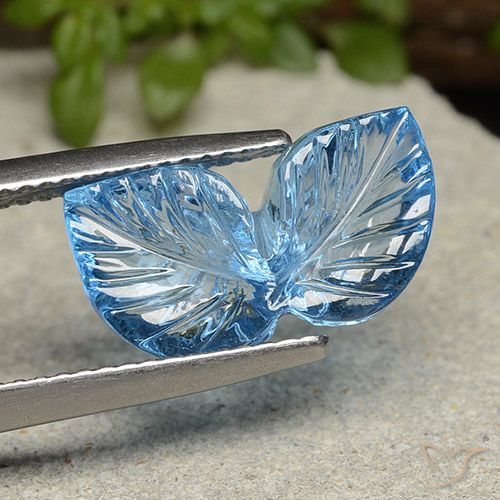 5.60ct 자연스러운 스위스 블루 황옥, 플라워 컷, 투명한