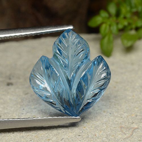 7.93ct 자연스러운 스위스 블루 황옥, 플라워 컷, 투명한