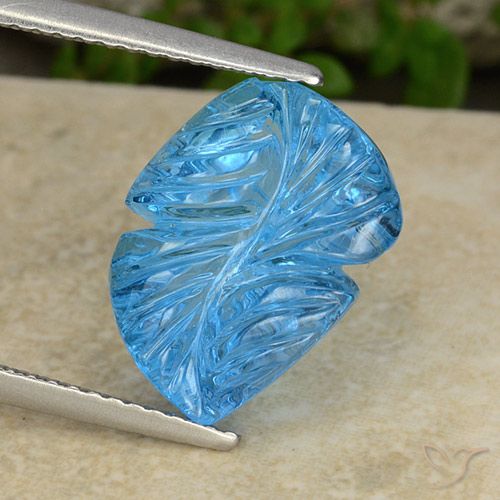 7.38ct 자연스러운 스위스 블루 황옥, 플라워 컷, 투명한
