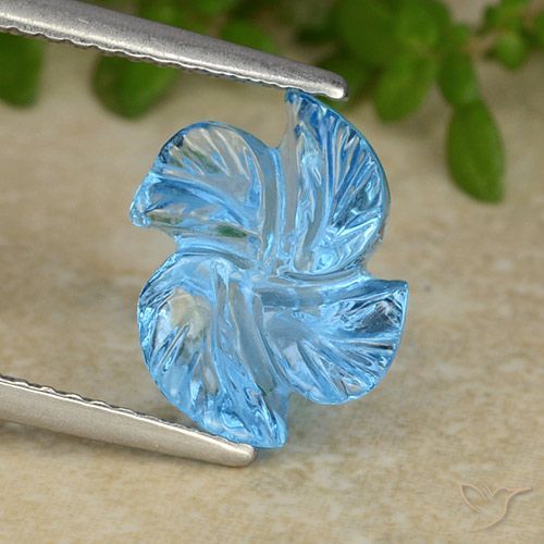 4.11ct 자연스러운 스위스 블루 황옥, 플라워 컷, 투명한