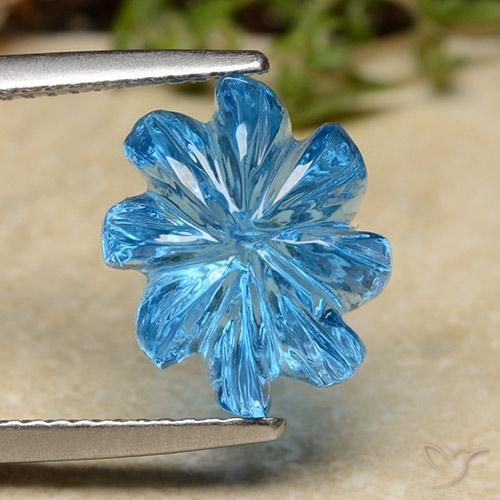 7.62ct 자연스러운 스위스 블루 황옥, 플라워 컷, 투명한
