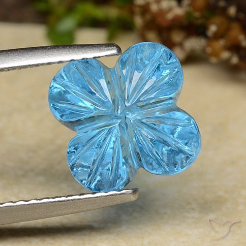6.04ct 자연스러운 스위스 블루 황옥, 플라워 컷, 투명한
