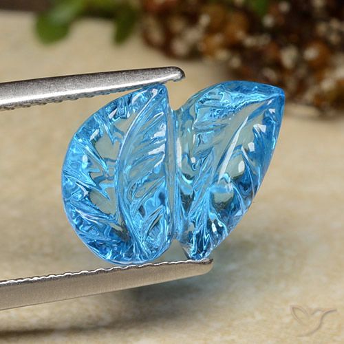 5.81ct 자연스러운 스위스 블루 황옥, 플라워 컷, 투명한