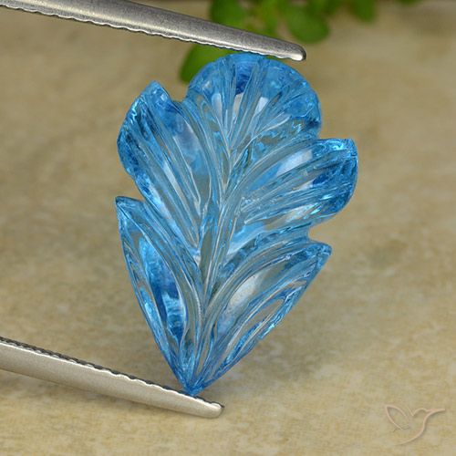 10.37ct 자연스러운 스위스 블루 황옥, 플라워 컷, 투명한