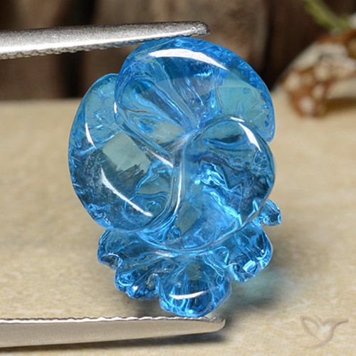 12.28ct 자연스러운 스위스 블루 황옥, 플라워 컷, 투명한
