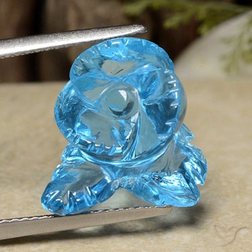 12.63ct 자연스러운 스위스 블루 황옥, 플라워 컷, 투명한