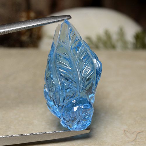 16.08ct 자연스러운 하늘색 황옥, 플라워 컷, 투명한
