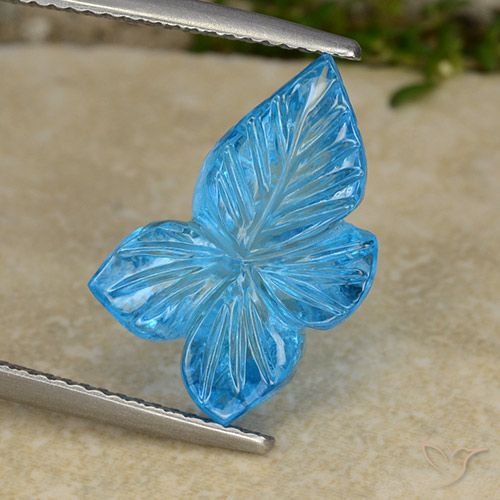 8.01ct 자연스러운 스위스 블루 황옥, 플라워 컷, 투명한