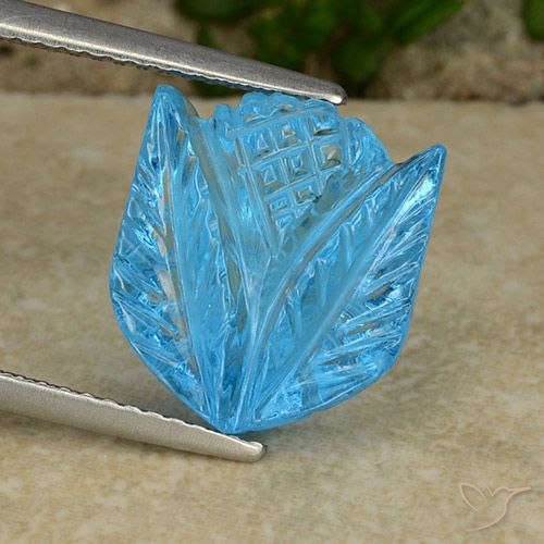 8.41ct 자연스러운 스위스 블루 황옥, 플라워 컷, 투명한