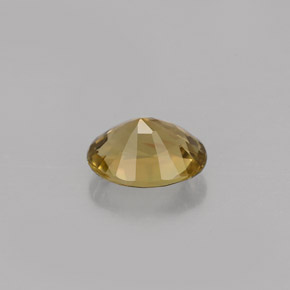 0.82캐럿 천연 녹빛 골든 브라운 투르말린, 타원형 컷, 6.8×5.5 mm, VVS