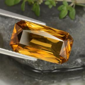 7.91캐럿 천연 다크 오렌지-골드 지르콘, 에메랄드 컷, 14.7×8 mm, VS