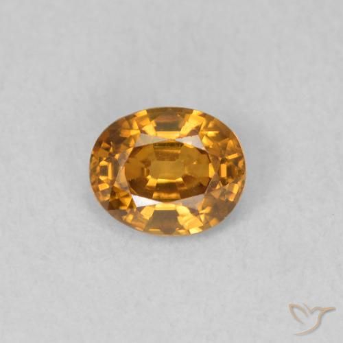 0.59ct 자연스러운 미디엄 오렌지 지르콘, 타원형, VVS